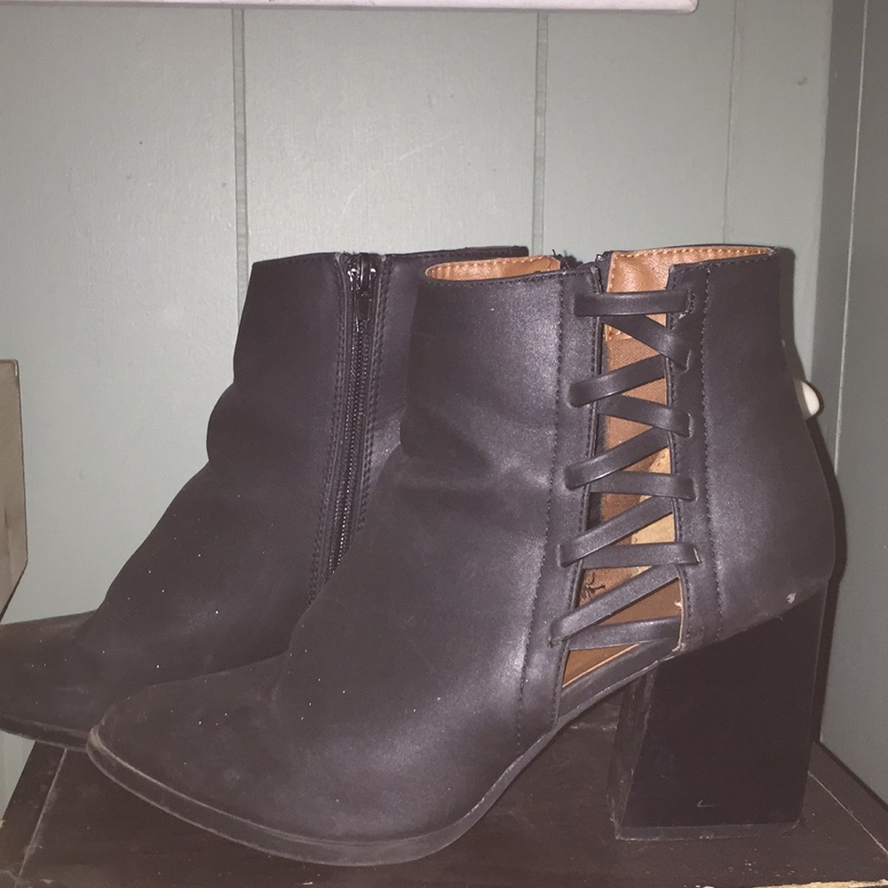 Black booties with chunky heel, and open sides!